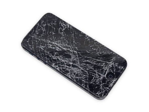 Repair workspace with phone parts